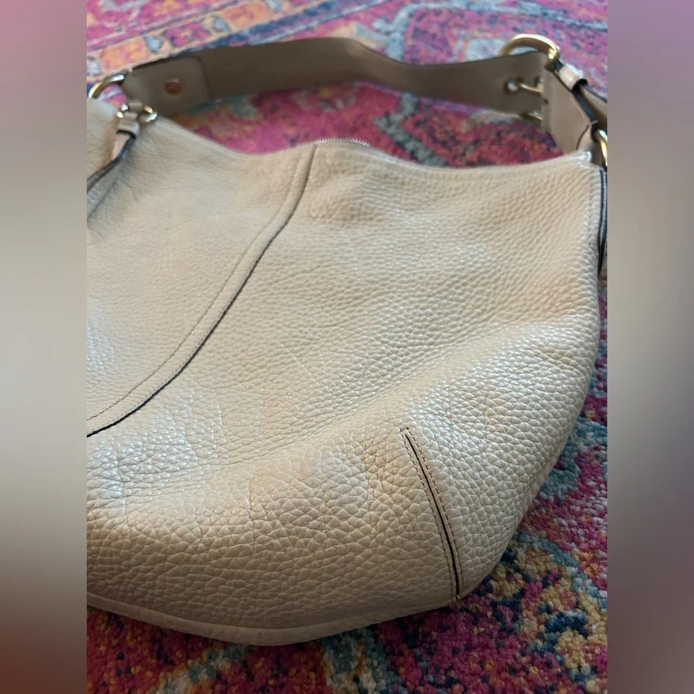 Coach | Women’s cream pebbled leather round bottom over the shoulder purse, OS
